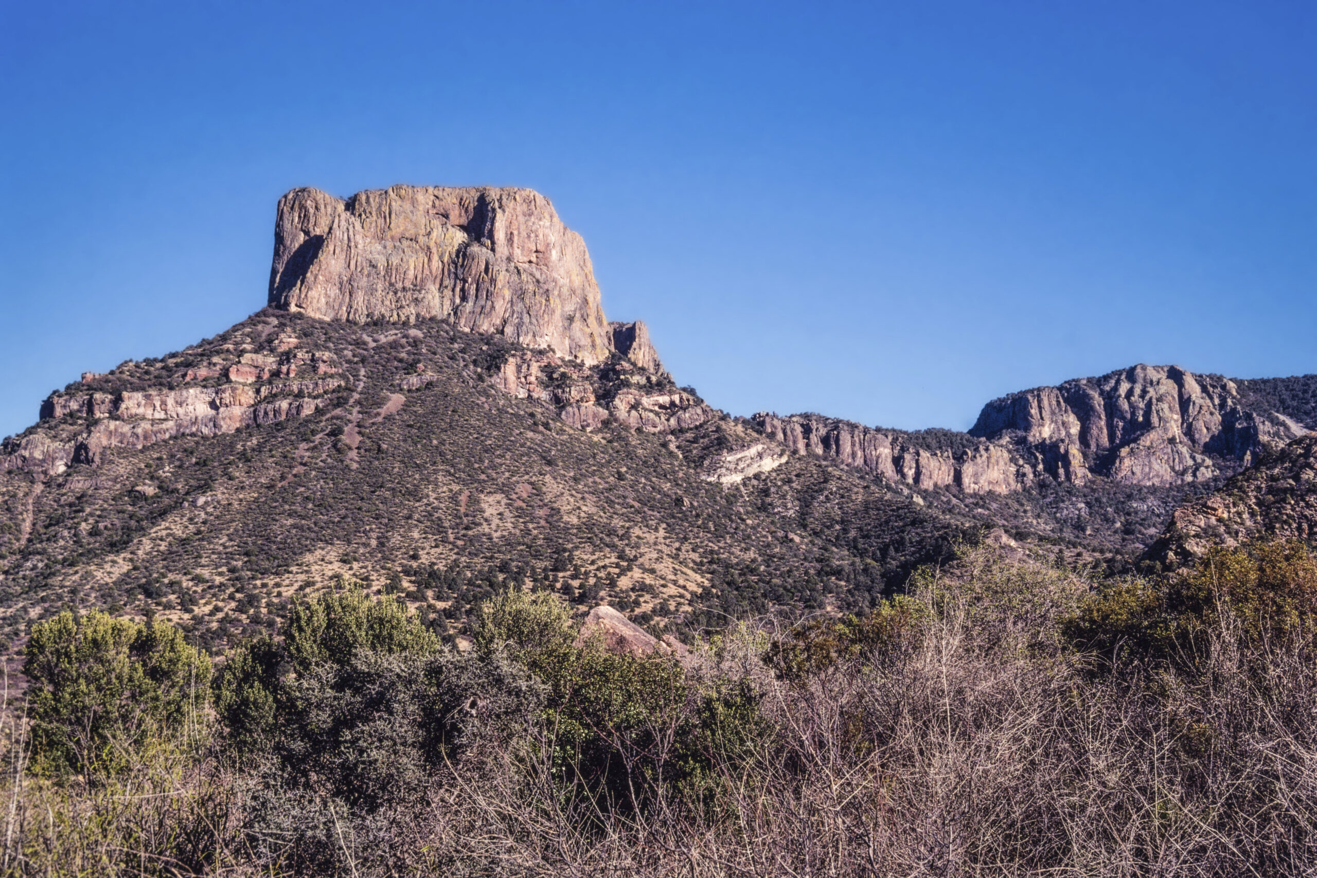 Casa Grande Peak in the Chisos Mountains of Big Bend National Park, Texas, has an elevation of 7,325 feet.